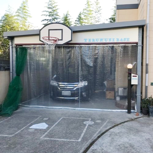 福岡県福岡市の糸入りカーテン(駐車場)の施工・製作事例
