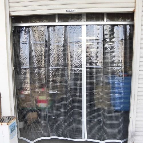 長崎県長崎市の倉庫入口防炎ビニールカーテンの施工・製作事例