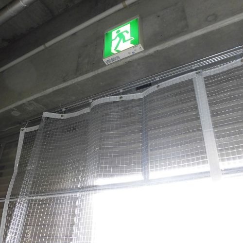 長崎県長崎市の倉庫入口防炎ビニールカーテンの施工・製作事例