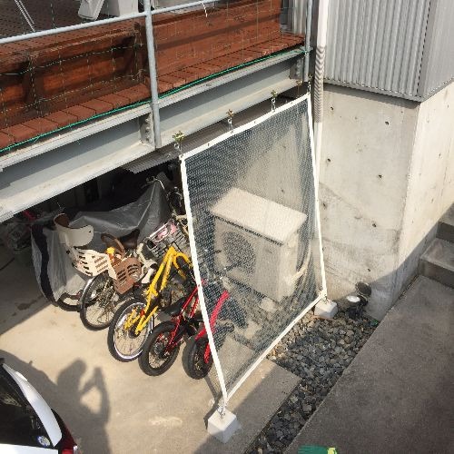 愛知県名古屋市の雨よけ糸入りカーテン(駐輪場)の施工・製作事例
